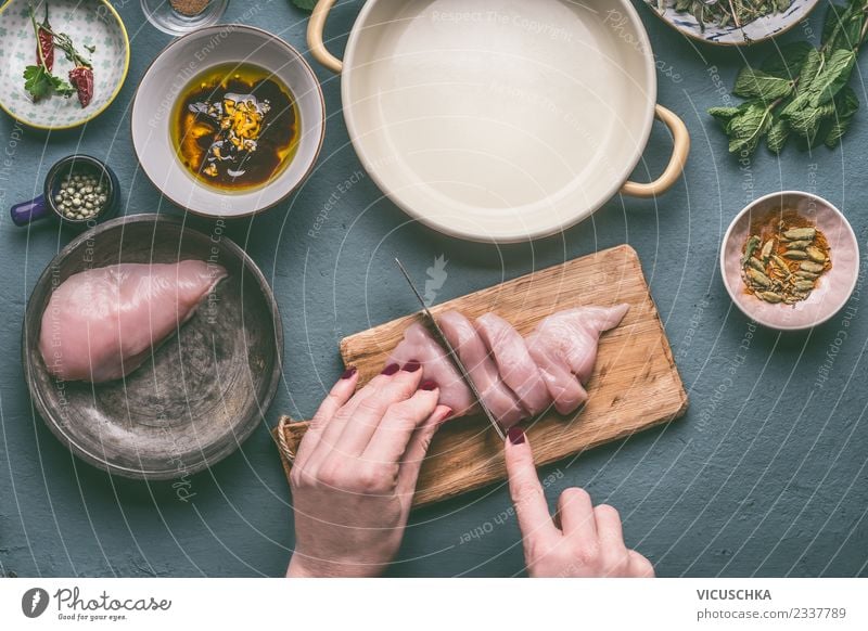 Hands cut chicken breast on the kitchen table Food Meat Nutrition Organic produce Diet Crockery Bowl Knives Style Design Healthy Eating Living or residing Table