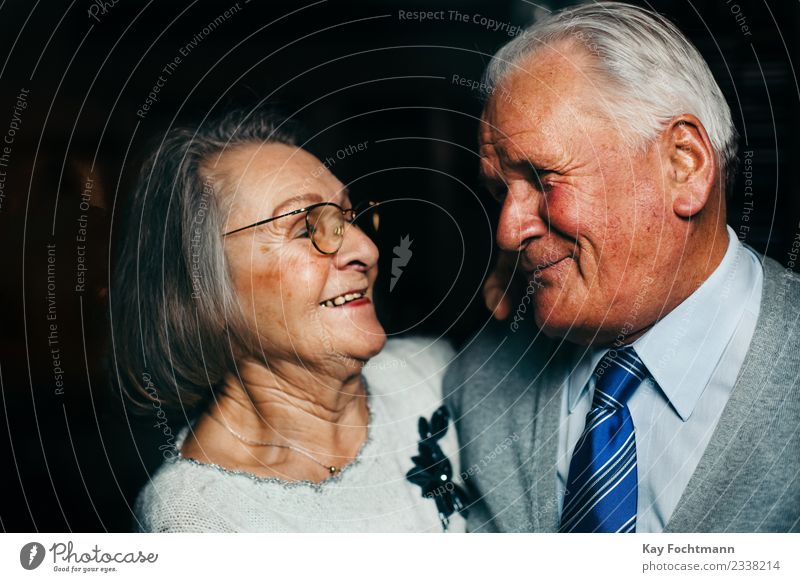 Smiling senior couple looks lovingly into each other's eyes Healthy Care of the elderly Harmonious Well-being Contentment Female senior Woman Male senior Man
