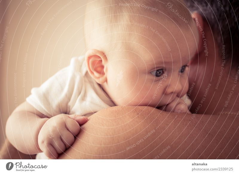 Father holding newborn baby son at the day time. Concept of happy family. Lifestyle Joy Happy Relaxation Leisure and hobbies Playing Vacation & Travel Freedom