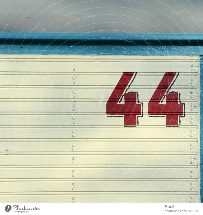 45 Sign Blue Red White Digits and numbers House number 44 Midlife Crisis Colour photo Multicoloured Exterior shot Pattern Structures and shapes Deserted