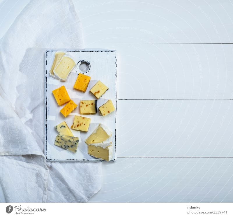 brie cheese, roquefort, camembert, cheddar Cheese Breakfast Dinner Table Wood Exceptional Delicious Yellow White Brie Slice piece Napkin Tasty Meal Swiss