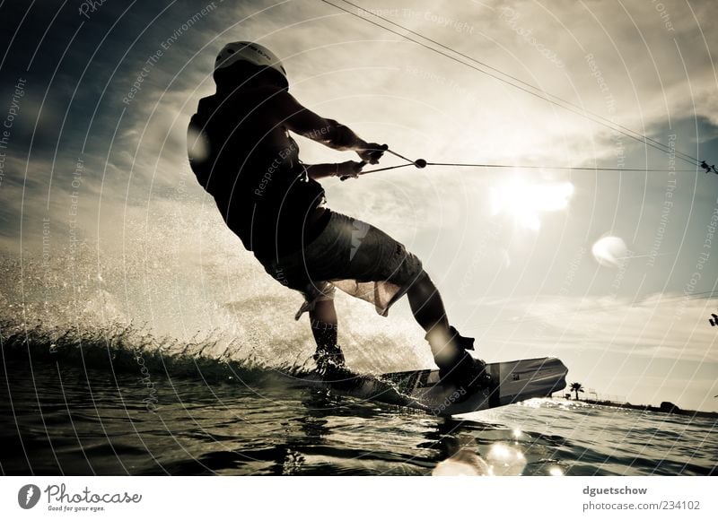 wakeboarder Leisure and hobbies Sports Aquatics Human being Masculine Man Adults Speed Athletic Enthusiasm Colour photo Exterior shot Day Light Contrast
