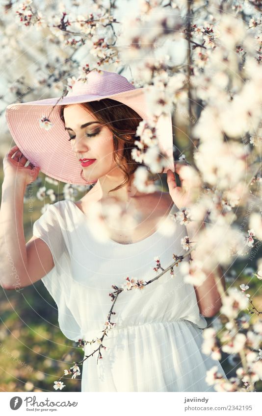 Eyes closed woman between almonds flowers in spring Beautiful Human being Feminine Young woman Youth (Young adults) Woman Adults 1 18 - 30 years Nature Tree
