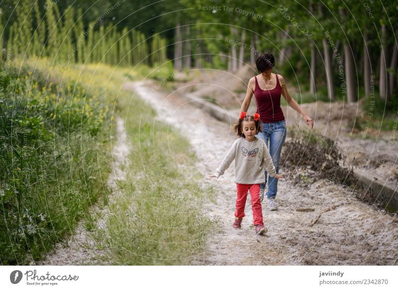Happy mother with her little daughter in rural road. Lifestyle Playing Child Human being Baby Woman Adults Parents Mother Family & Relations Infancy 2