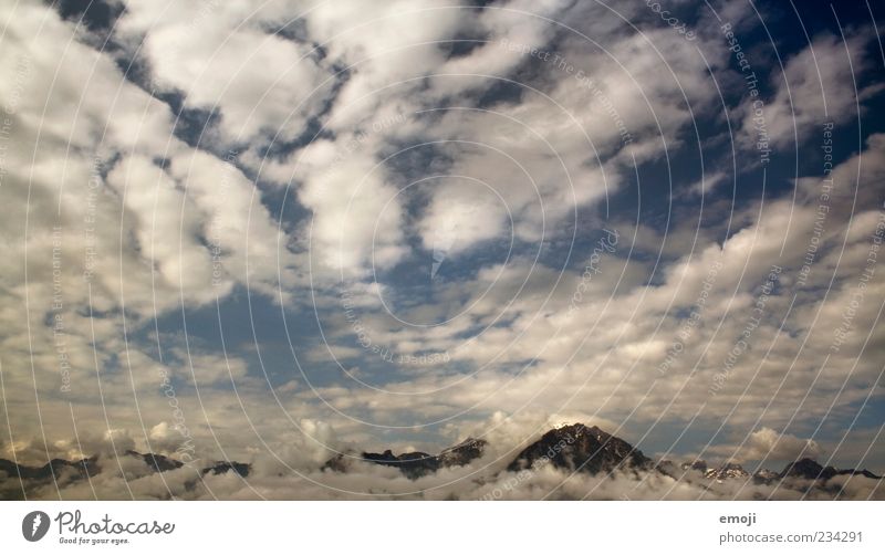 to heaven Environment Air Earth Sky Clouds Storm clouds Horizon Climate Climate change Weather Thunder and lightning Alps Mountain Peak Blue Above Altimeter