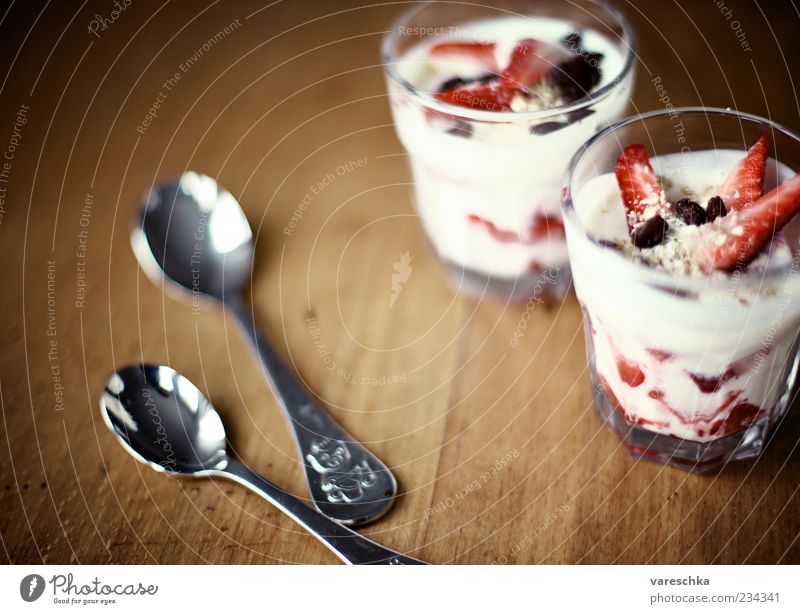 Small breakfast Yoghurt Dairy Products Fruit Strawberry Raisins Oat flakes Breakfast Organic produce Spoon Fresh Healthy Delicious Colour photo Close-up Morning