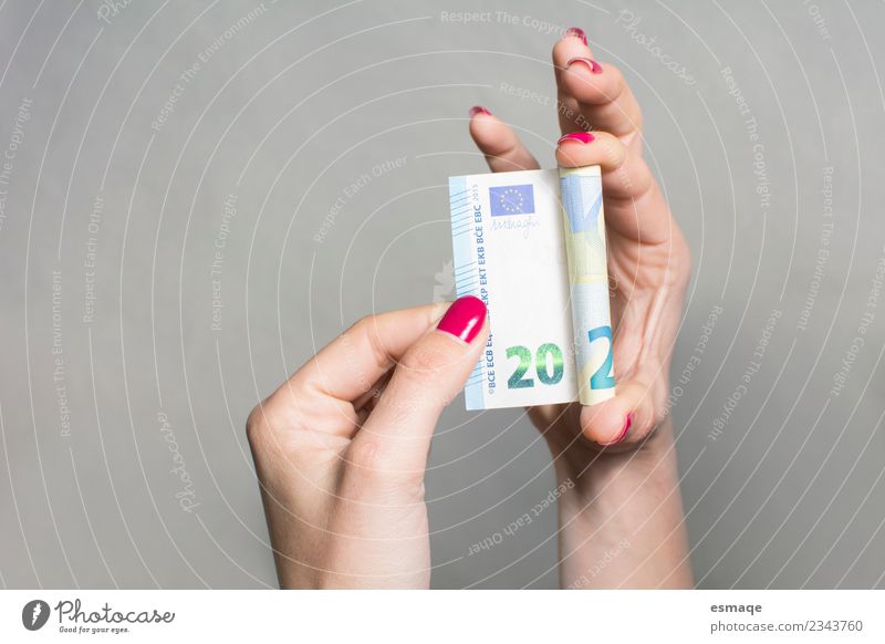 woman's hands holding a 20 euro bill Economy Hand Bank note Money Select Shopping Interior shot Studio shot Deserted