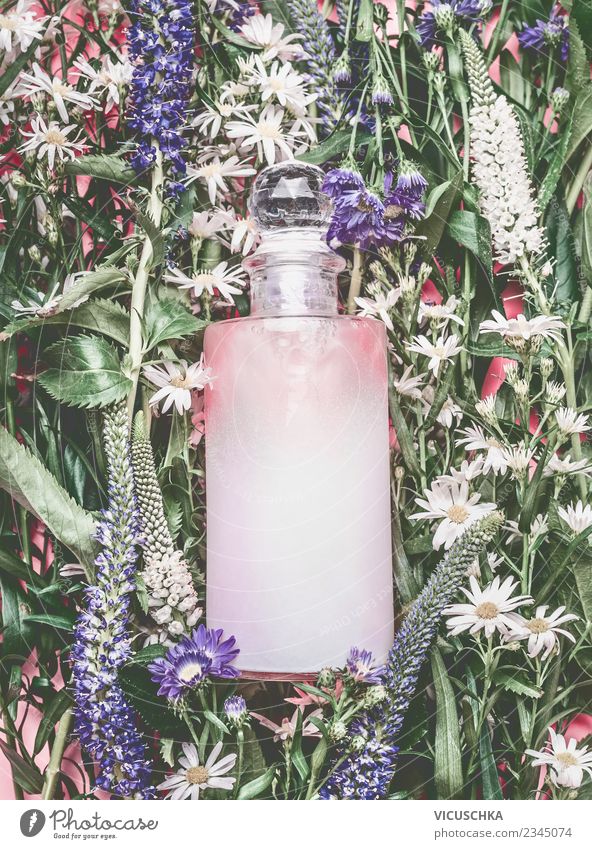 Natural cosmetics. Pink cosmetics bottle on flowers and plants Shopping Style Design Beautiful Cosmetics Perfume Healthy Wellness Spa Summer Nature Plant Flower