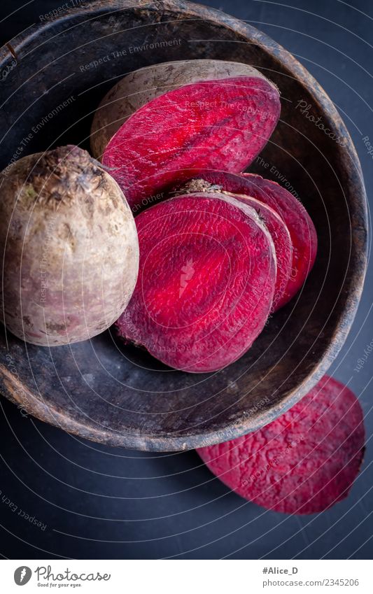 Fresh beetroot turnips in slices Rustikal still life Food Vegetable Red beet Rapes Bowl Healthy Eating Agricultural crop Wood Dark Delicious Natural Retro Juicy