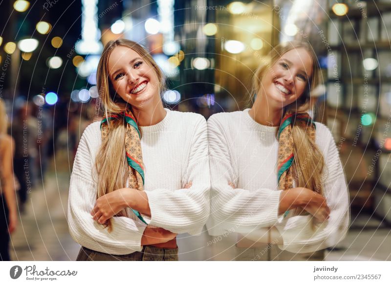 Young woman at night reflected in a shop window. Style Beautiful Human being Feminine Youth (Young adults) Woman Adults 1 18 - 30 years Street Fashion Clothing
