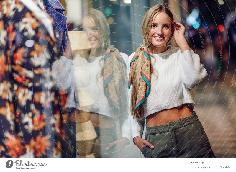 Blonde girl wearing white sweater smiling outdoors Lifestyle Shopping Style Happy Beautiful Hair and hairstyles Winter Human being Feminine Young woman