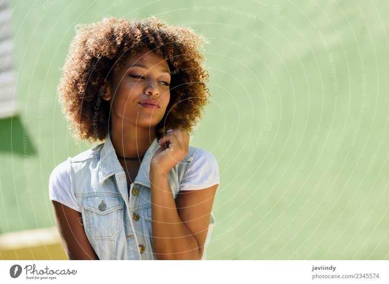 Young black woman, afro hairstyle, smiling outdoors Lifestyle Style Beautiful Hair and hairstyles Face Human being Feminine Young woman Youth (Young adults)