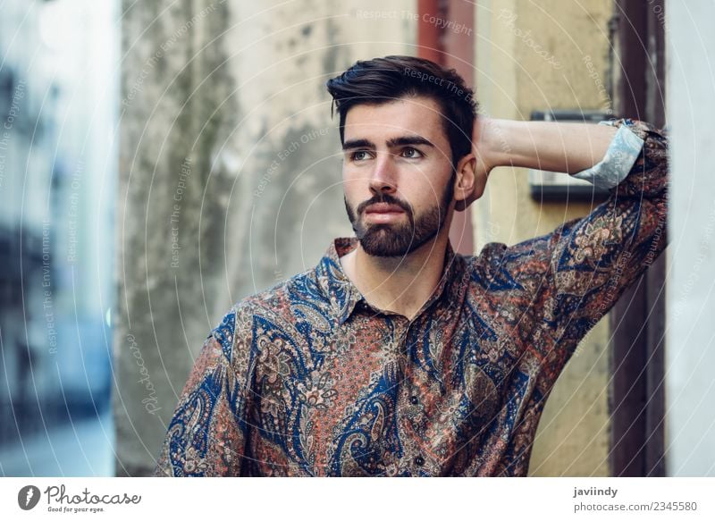 Young bearded man looking away outdoors Lifestyle Style Beautiful Hair and hairstyles Human being Masculine Young man Youth (Young adults) Man Adults 1