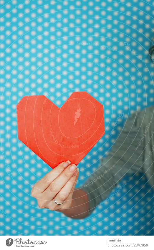 Woman's hand holding a red paper heart Design Joy Healthy Wellness Well-being Human being Feminine Young woman Youth (Young adults) Hand 1 18 - 30 years Adults