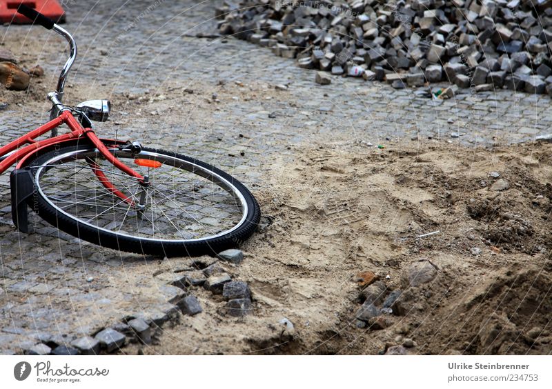 slip Bicycle Playground Traffic infrastructure Traffic accident Street Stone Sand To fall Lie Dirty Stagnating Sudden fall Construction site Hollow Cobblestones