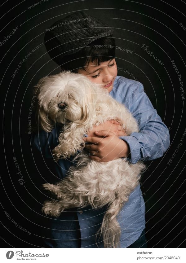 boy hugging his dog Lifestyle Joy Human being Masculine Child Boy (child) Infancy 1 3 - 8 years Cap Animal Pet Dog To hold on Smiling Laughter Love Friendliness