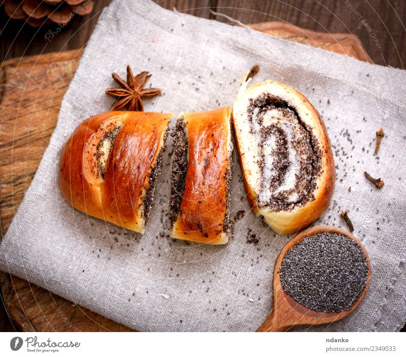 baked roll with poppy seeds Bread Dessert Spoon Table Wood Eating Fresh Delicious Above Brown Tradition biscuit Chopping board Home-made Cut Rustic Baked goods