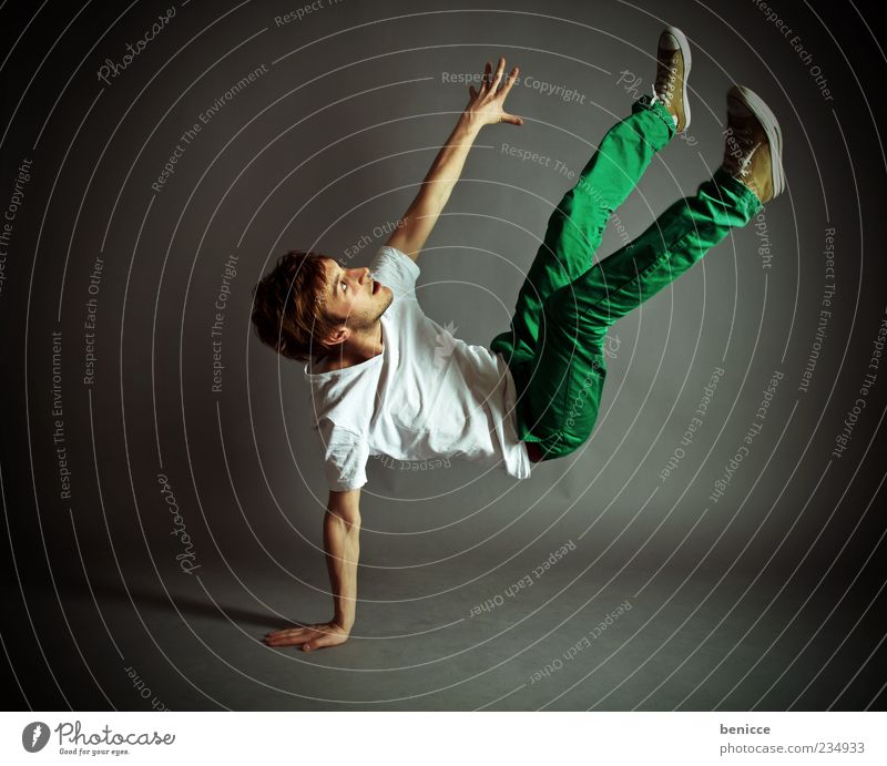dance Man Human being Youth (Young adults) Dance Breakdance To fall Athletic Dancer Studio shot Isolated Image Acrobat Acrobatics Movement Cool (slang)