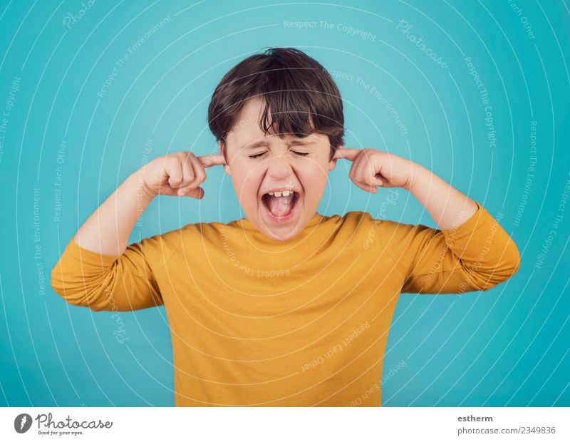portrait of a Screaming little boy covering ears with hands Lifestyle Human being Child Boy (child) Infancy 3 - 8 years To talk Fitness Aggression Threat Creepy