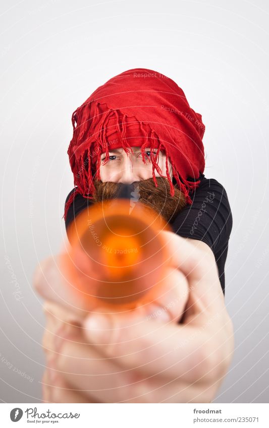 plop Carnival Human being Masculine Woman Adults Man Facial hair Headscarf Beard Aggression Funny Rebellious Trashy 1 Assassin Terrorist Handgun