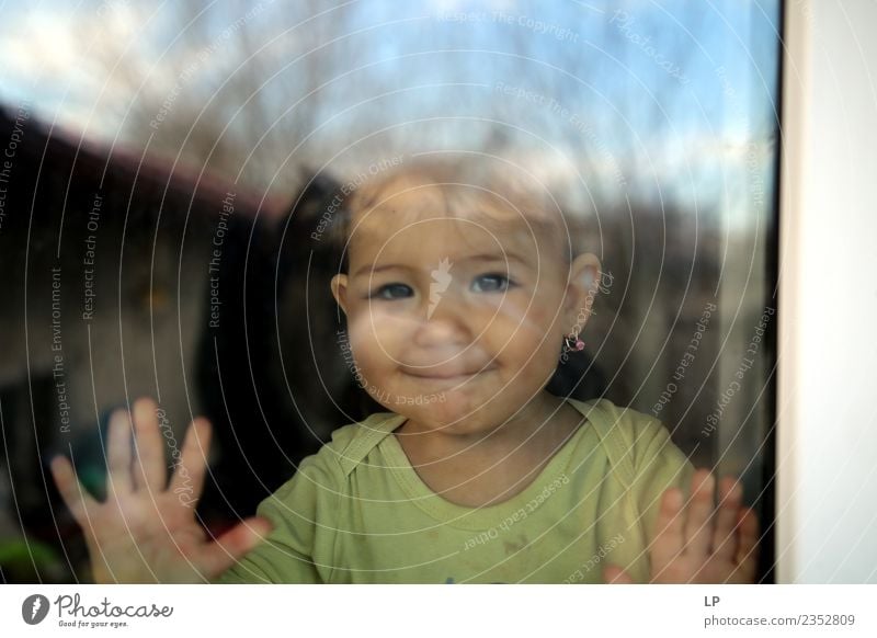 beautiful baby smiling and watching through a window Lifestyle Joy Playing Children's game Parenting Education Kindergarten Human being Baby Parents Adults