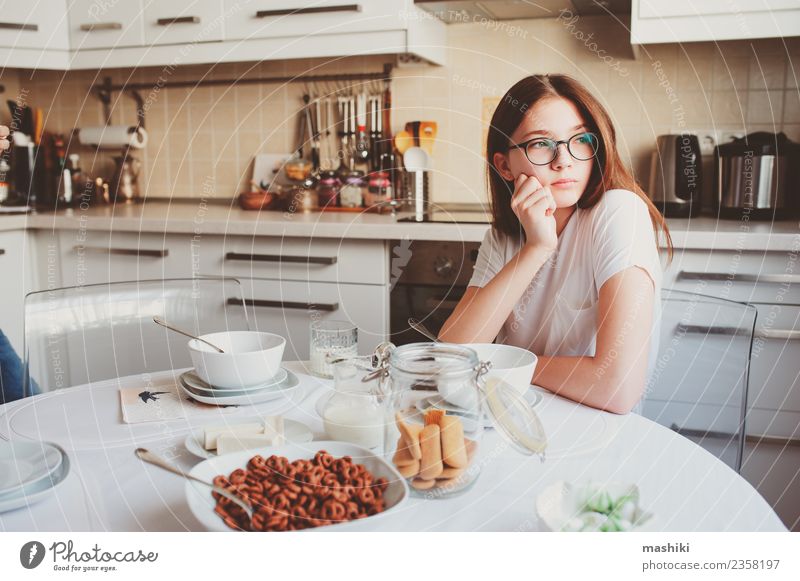 teen girl having breakfast Breakfast Lifestyle Joy Happy Kitchen Child Sister Youth (Young adults) Smiling Embrace Together Modern White Relationship
