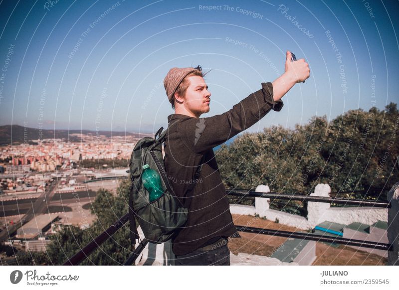 Young man is taking selfie at the top of the city Dusk Emotions Happy Life Lifestyle Summer Sun Sunset Youth (Young adults) Adventure Freedom Joy Good Goodness