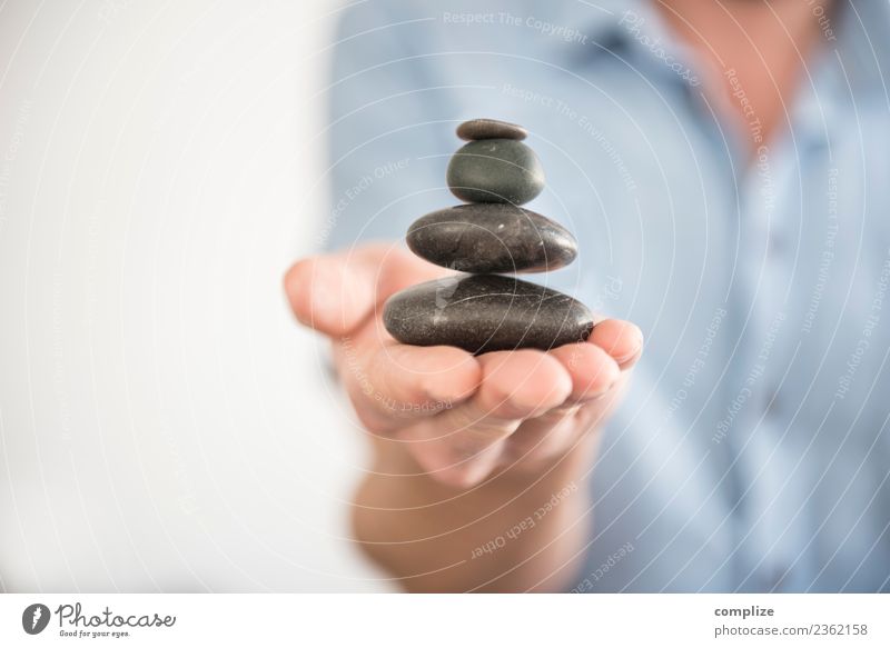 Find Balance - stone tower on hand Healthy Health care Medical treatment Alternative medicine Medication Wellness Life Harmonious Well-being Relaxation Calm