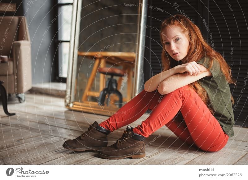 indoor portrait of beautiful young redhead woman Lifestyle Style Relaxation Woman Adults Youth (Young adults) Fashion Boots Red-haired Wood Metal Dark Modern