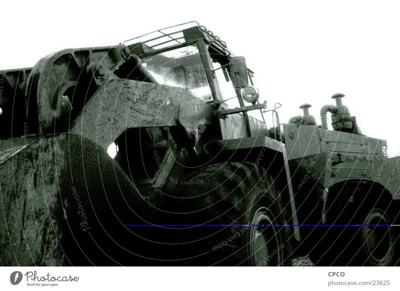 Excavator 1 Construction vehicle Construction site Wide angle Vehicle Electrical equipment Technology Black & white photo excavator wheel
