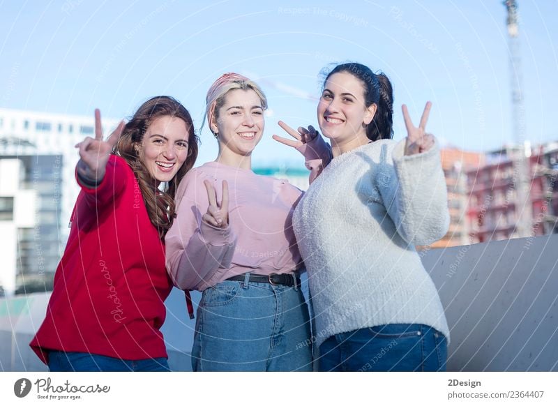 Portrait Of Three Young Happy Girls Gesturing A Royalty Free Stock Photo From Photocase