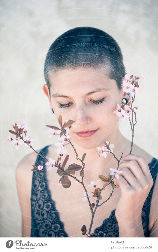 Springtime woman Beautiful Personal hygiene Body Hair and hairstyles Skin Face Androgynous Young woman Youth (Young adults) Flower Cherry blossom Almond blossom