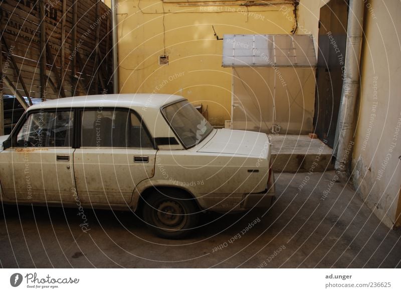 pinaco lada Car Vintage car Old Authentic Dirty Good Historic White Joy Politics and state Colour photo Exterior shot Deserted Copy Space right Shadow