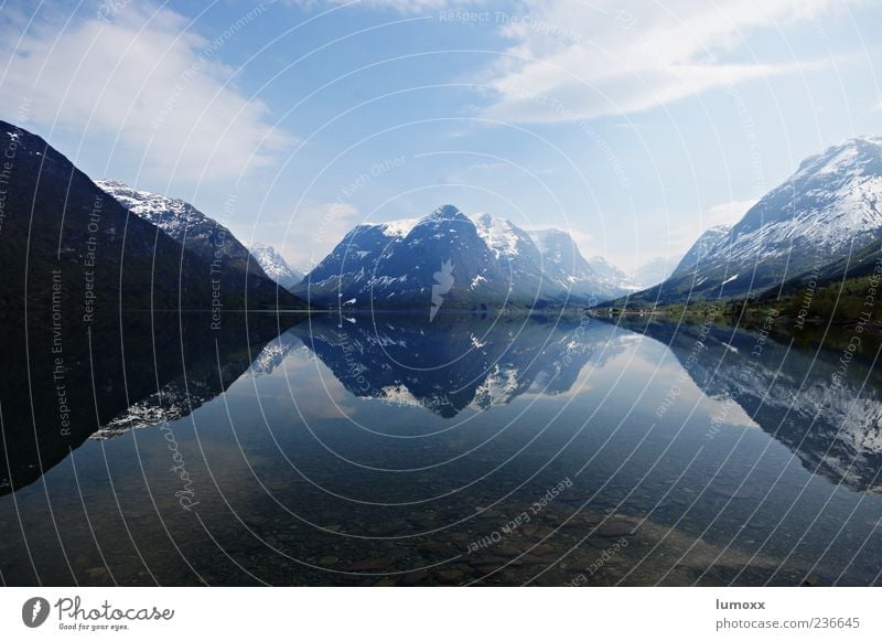 natural reflex Nature Landscape Sky Clouds Mountain Snowcapped peak Coast Lakeside Fjord Norway Scandinavia Europe Authentic Exceptional Blue Black White