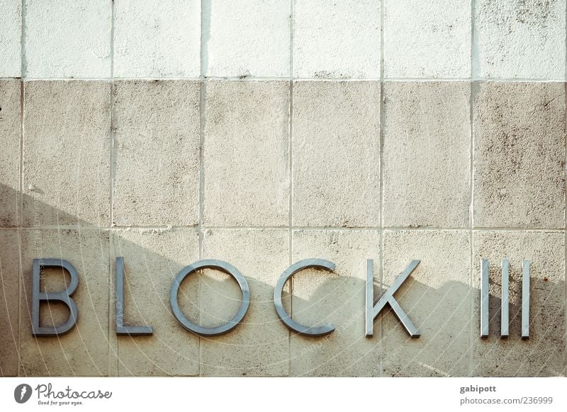 Block III House (Residential Structure) Wall (barrier) Wall (building) Facade Tile Stone Concrete Metal Characters Digits and numbers Signs and labeling Gloomy