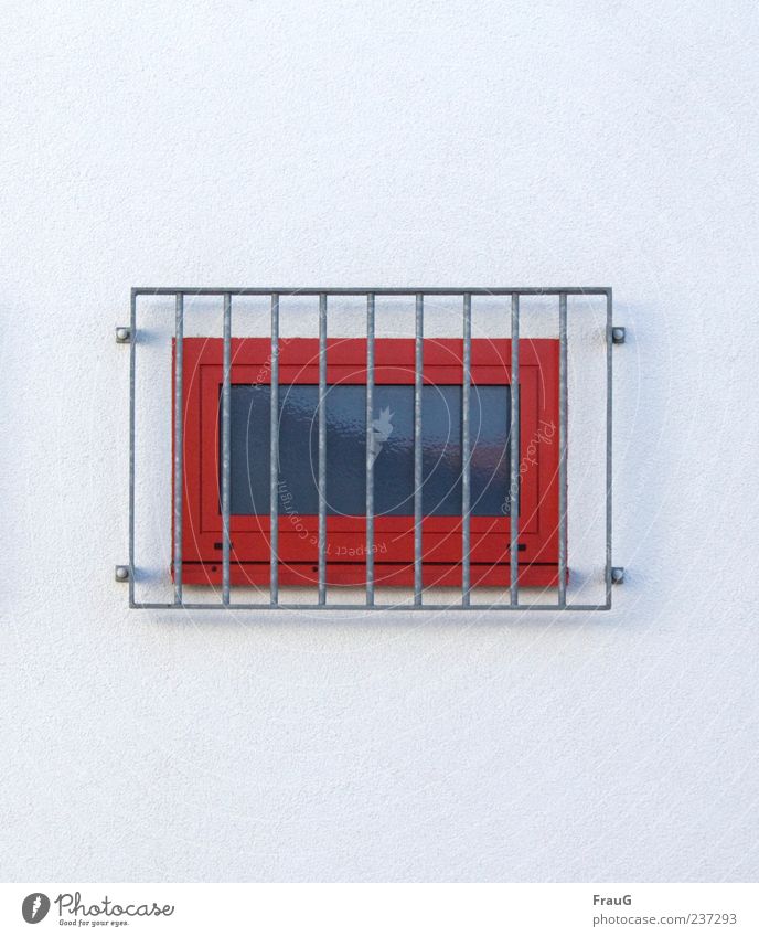 behind bars Building Wall (barrier) Wall (building) Window Grating Concrete Metal Gray Red Safety Protection Colour photo Exterior shot Day Reflection
