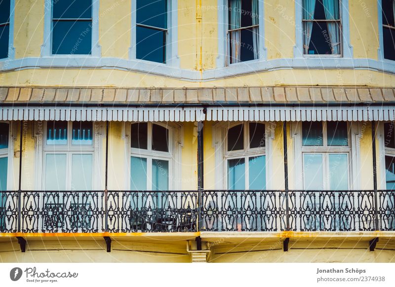yellow facade with balcony in Brighton, England Town Downtown Populated House (Residential Structure) Building Architecture Facade Window Contentment Yellow