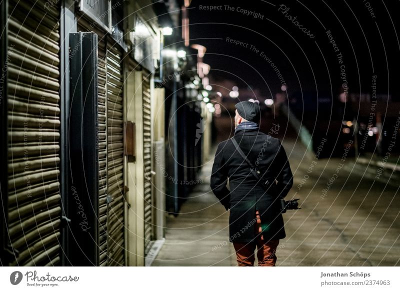 Photographer walks through the city at night Vacation & Travel Tourism Sightseeing City trip Masculine 1 Human being Brighton Great Britain Europe Town Downtown