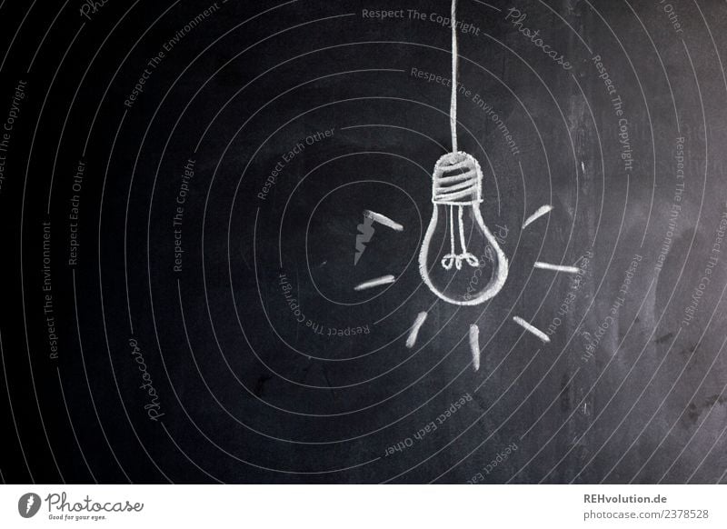 blackboard drawing  light bulb - a Royalty Free Stock Photo from