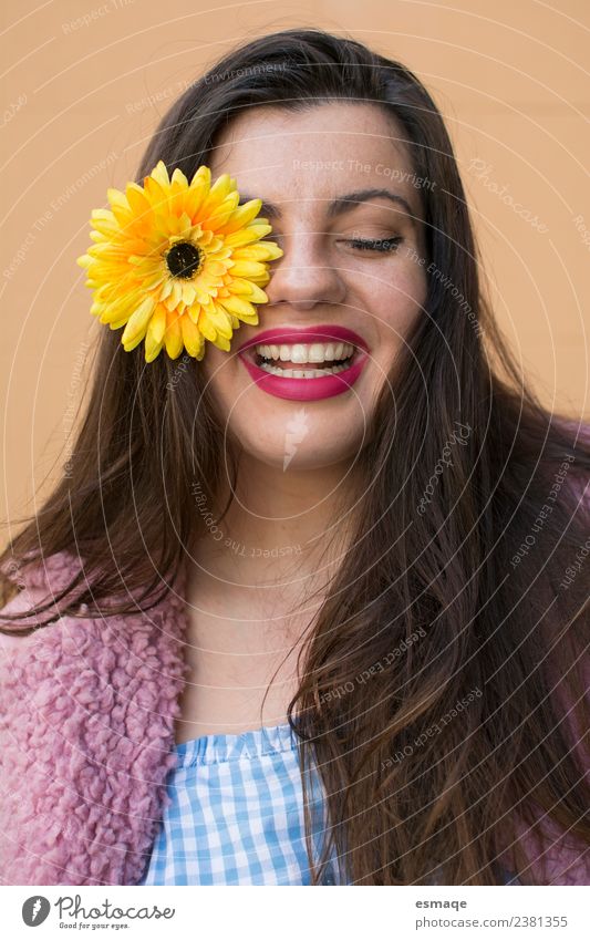 Portrait of Young woman smiling with a flower in her eye Lifestyle Joy Beautiful Face Healthy Wellness Feminine Youth (Young adults) Flower Fashion Smiling