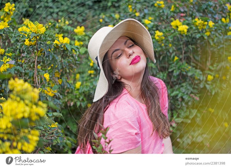 Young woman with hat in spring Lifestyle Joy Healthy Medical treatment Allergy Wellness Meditation Woman Adults Nature Flower Hat Feasts & Celebrations Smiling