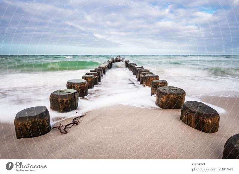 Buhnen at the coast of the Baltic Sea on a stormy day Relaxation Vacation & Travel Tourism Beach Ocean Waves Nature Landscape Water Clouds Gale Coast Wood Blue