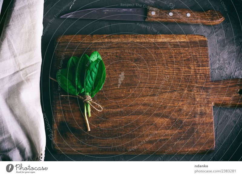 cutting board with handle and bunch with green sorrel Kitchen Leaf Old Eating Fresh Above Brown Green Black White knife Salad Napkin vintage Rustic empty