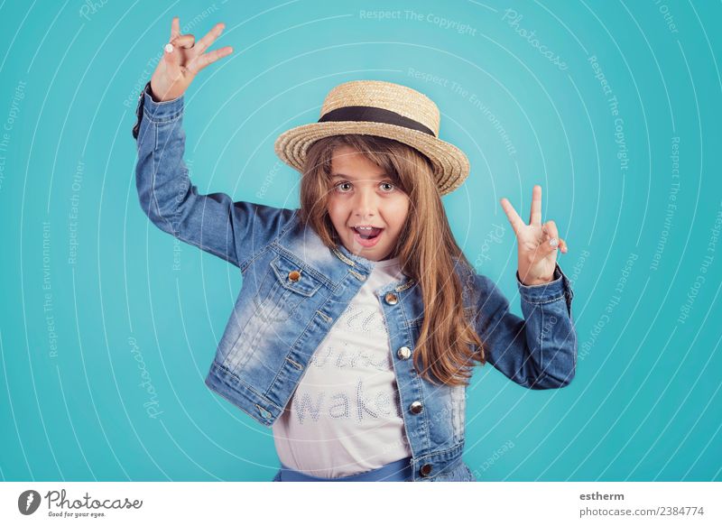 portrait of happy girl with hat on blue background Lifestyle Style Joy Vacation & Travel Tourism Trip Adventure Freedom Entertainment Party Event Human being