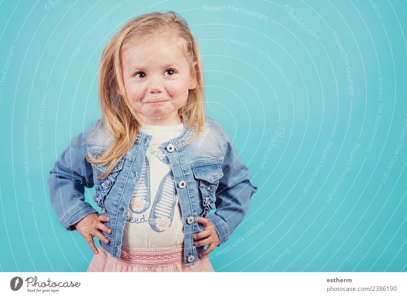 Smiling Baby On Blue Background A Royalty Free Stock Photo From