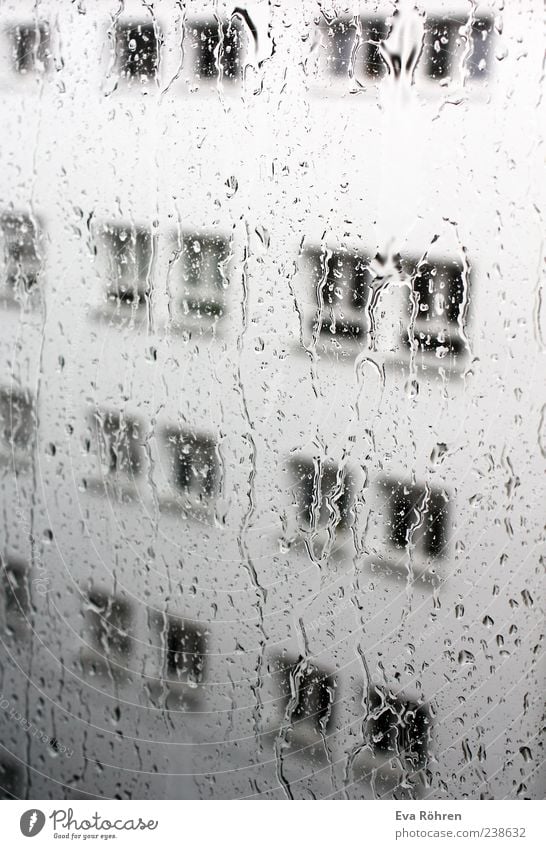 rain Window pane Environment Water Drops of water Weather Bad weather Rain House (Residential Structure) Facade Concrete Glass Wet Gray Loneliness