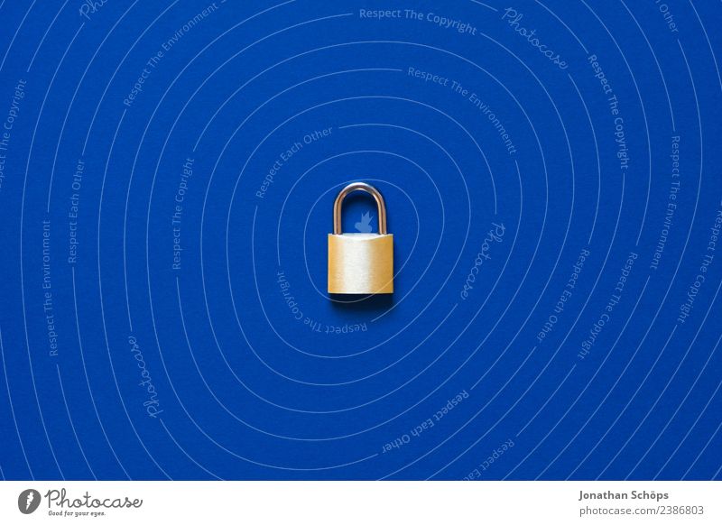 Lock as a symbol for data protection & DSGVO Telecommunications Business Blue Gold Safety basic data protection ordinance big data Copy Space Data protection