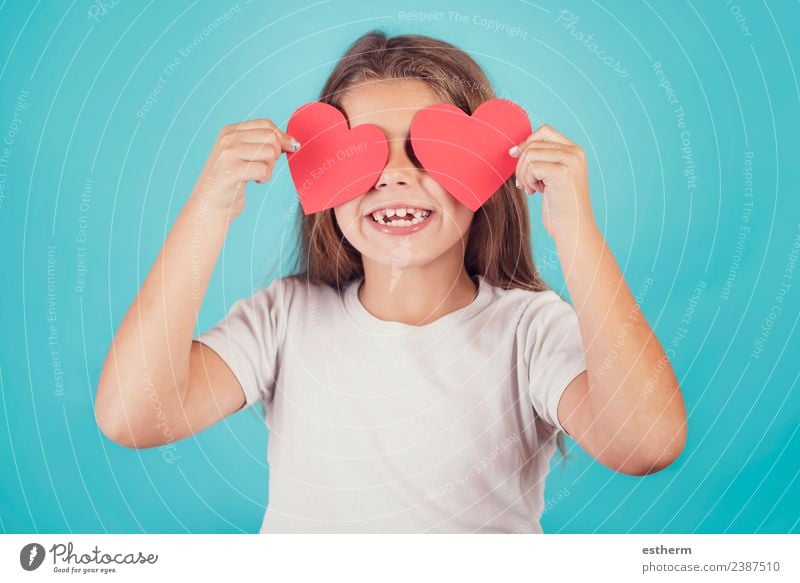smiling girl with hearts in her eyes on blue background Lifestyle Joy Entertainment Party Event Feasts & Celebrations Valentine's Day Mother's Day Human being