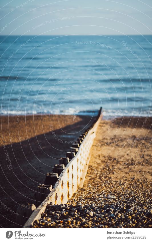 Separation wall at the beach, Brighton, England Environment Sky Sun Beautiful weather Snowcapped peak Coast Beach Ocean Island Esthetic Wall (barrier) Divide