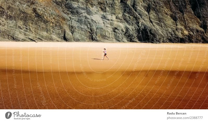Aerial Drone View Of Sportive Woman Running On Beach Lifestyle Athletic Fitness Wellness Adventure Freedom Summer Ocean Sports Sports Training Track and Field